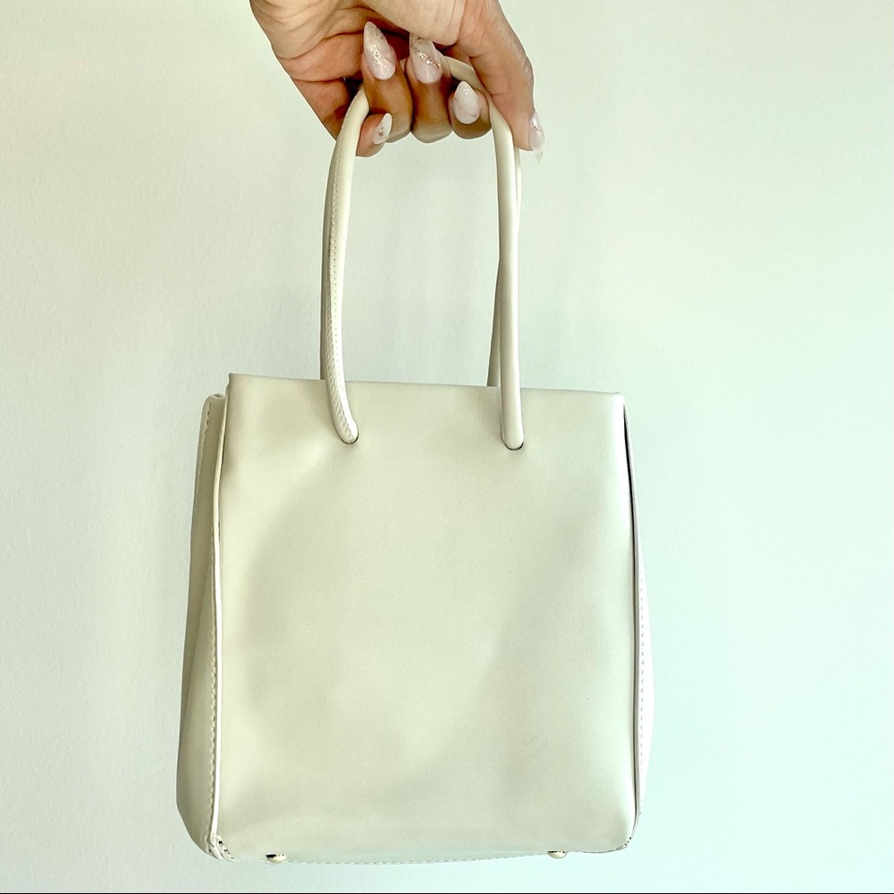 Cream Mini Hand Bag with adjustable straps and micro bag